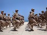 Soldiers of the Libyan National Army parade with their military pick-up vehicles during the graduation ceremony of new batch of the Libyan Navy special forces the Mediterranean sea port of Trip (4)